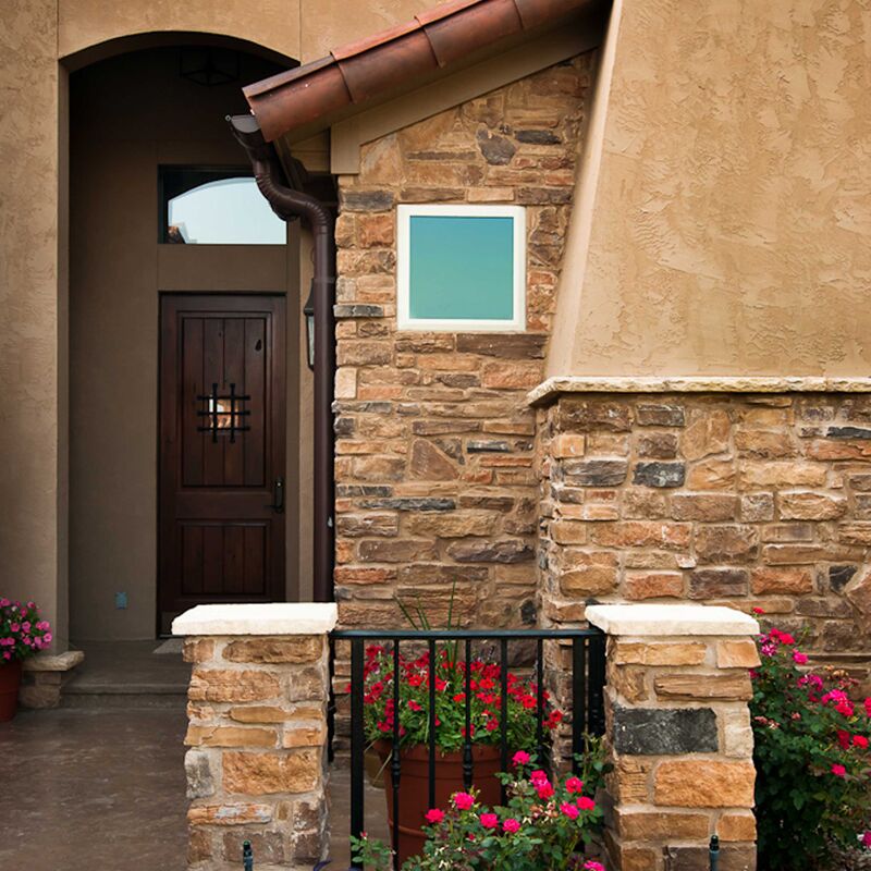 Window Sill as Trim Between Stucco and Stone Window Sill Mold